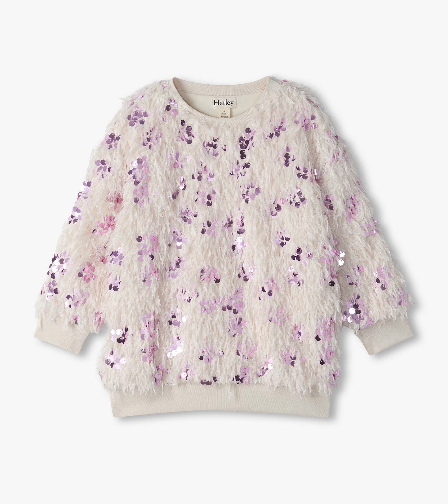 Cream pullover with shaggy feather-like texture, pink sequins, and ribbed crew neck, cuffs, and hem