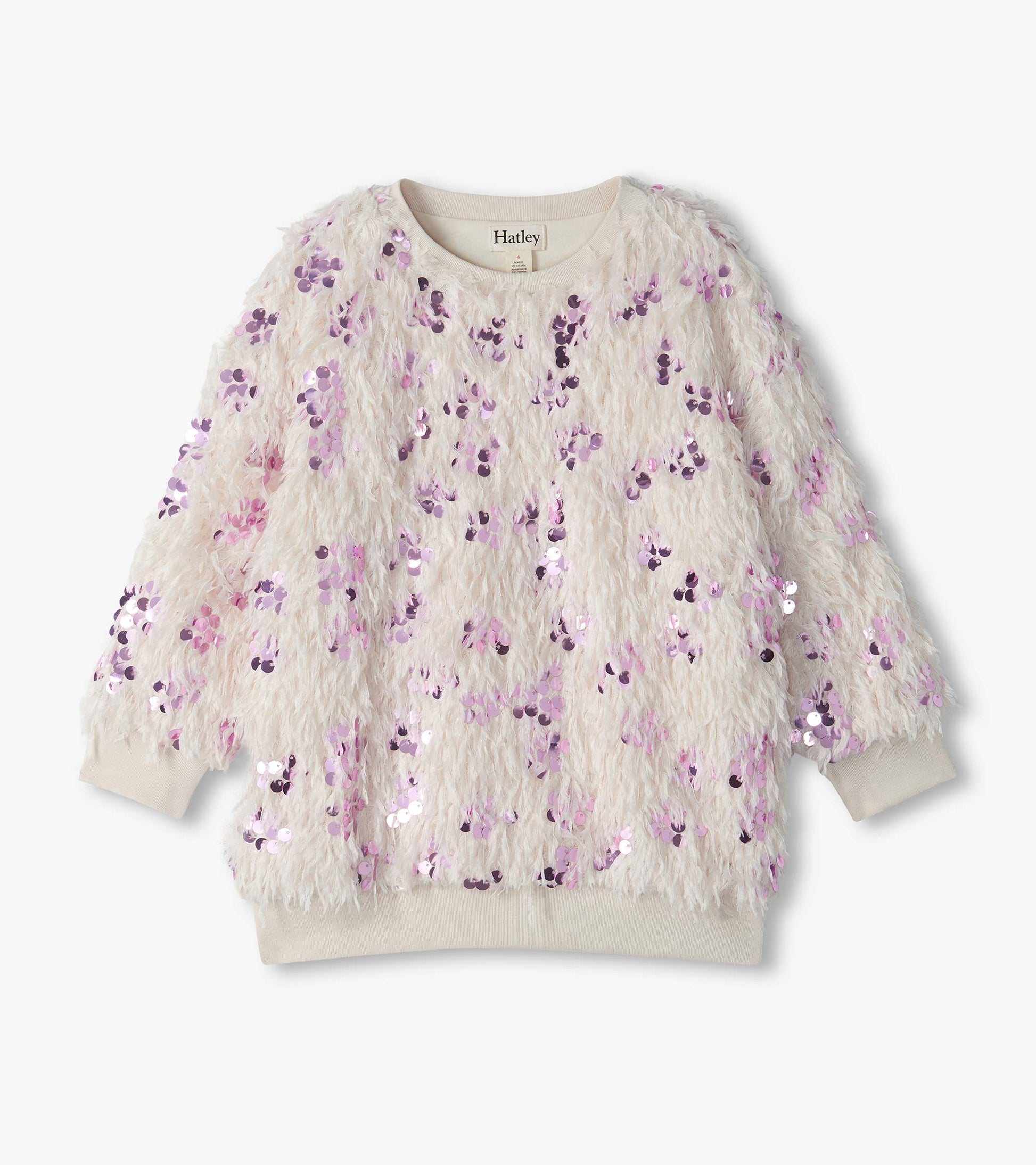 Cream pullover with shaggy feather-like texture, pink sequins, and ribbed crew neck, cuffs, and hem