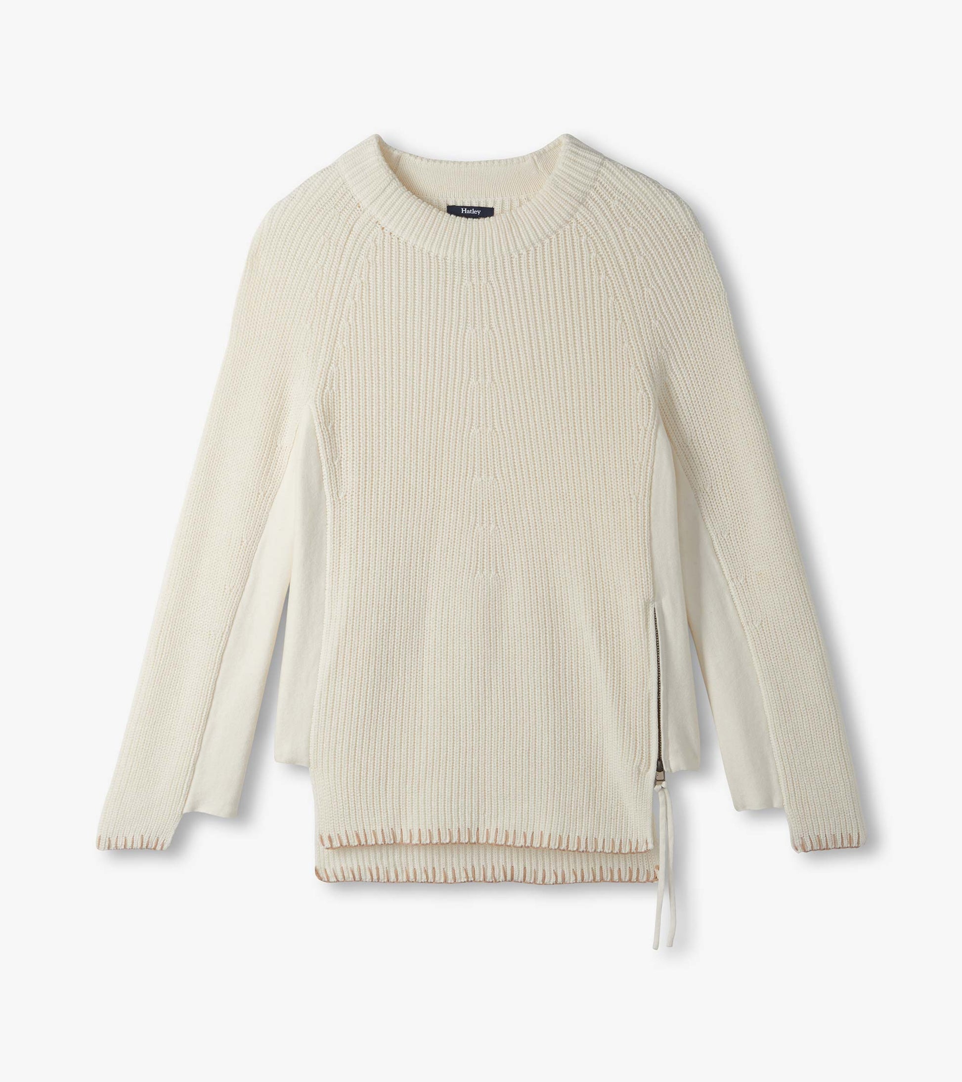 Cream raglan sweater laid flat with crew neck, side zipper and contrast side panels