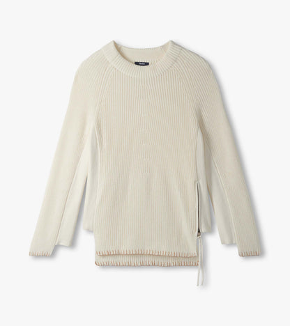 Cream raglan sweater laid flat with crew neck, side zipper and contrast side panels