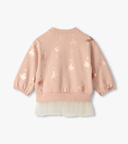 Back view of blush pink top with metallic ballerina print and cream tulle hem