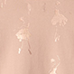 Soft beige surface with subtle vertical shiny streaks