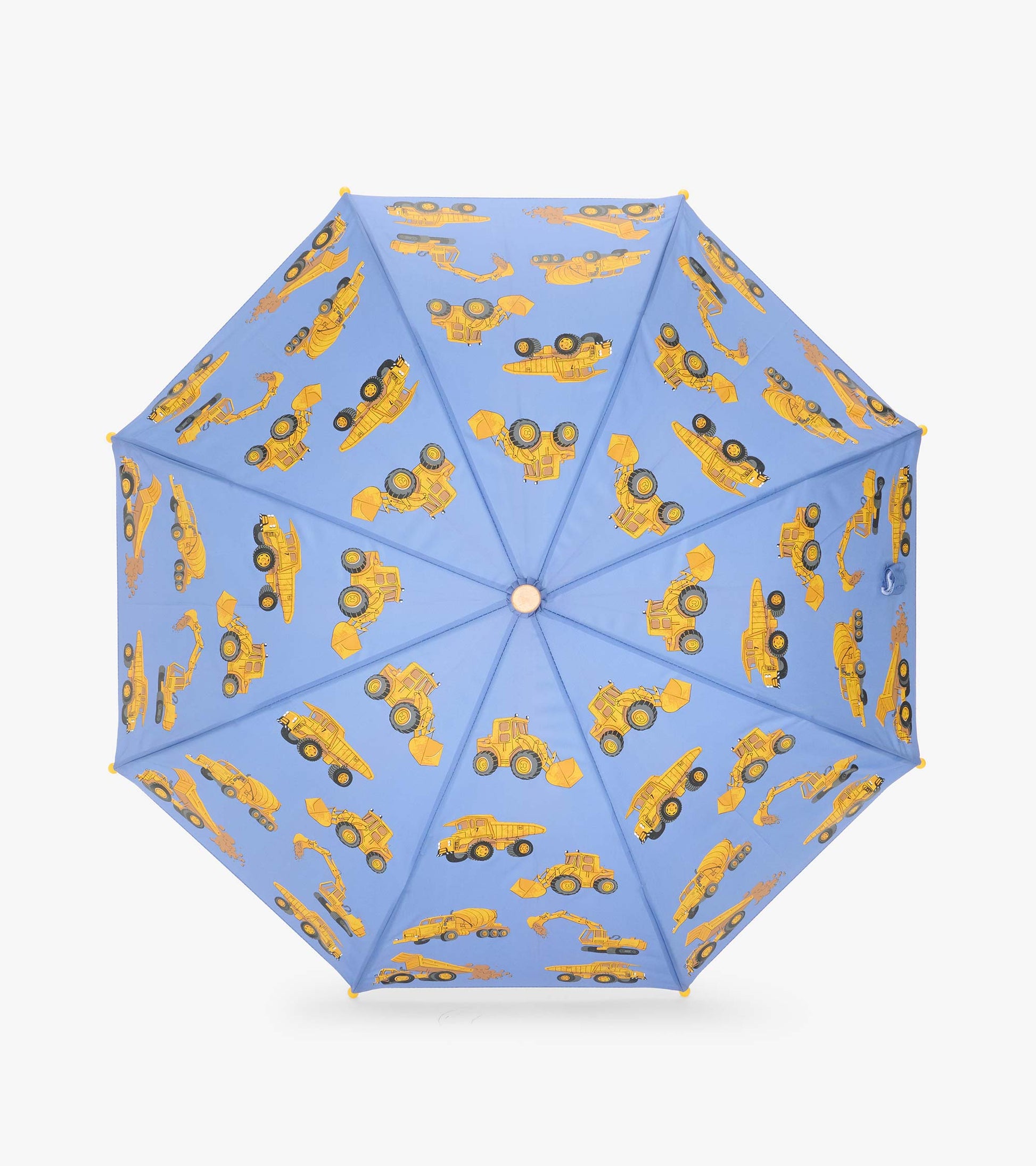 Top view of open blue umbrella with yellow construction vehicles printed across the canopy