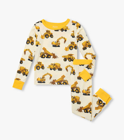 Two-piece boys pajama set with yellow construction truck print and bright yellow collar, cuffs, and waistband