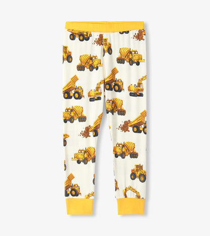 Pajama pants with yellow construction truck print on cream and bright yellow waistband and ankle cuffs