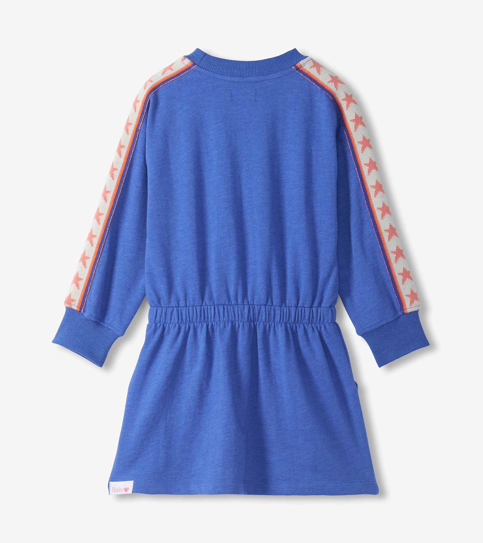 Back view of blue sweatshirt dress with ribbed cuffs and pink star trim down the sleeves