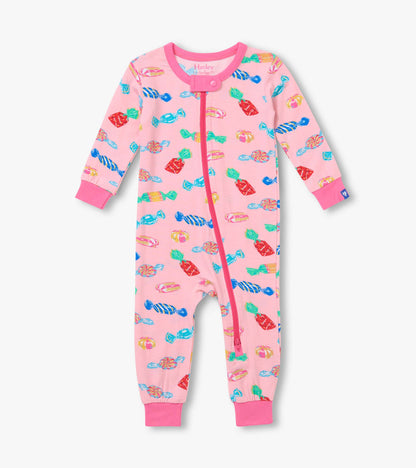 Front view of pink infant coverall with colorful candy print, full zip, and pink cuffs