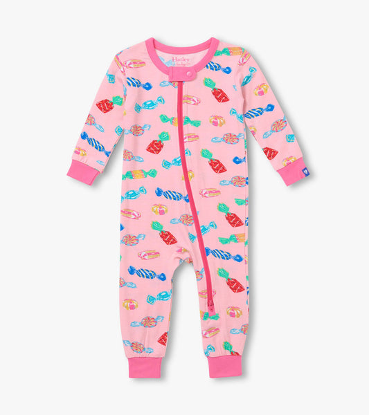 Front view of pink infant coverall with colorful candy print, full zip, and pink cuffs