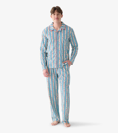 Men's two-piece pajama set with blue and white stripes and holiday icon print, shown on model
