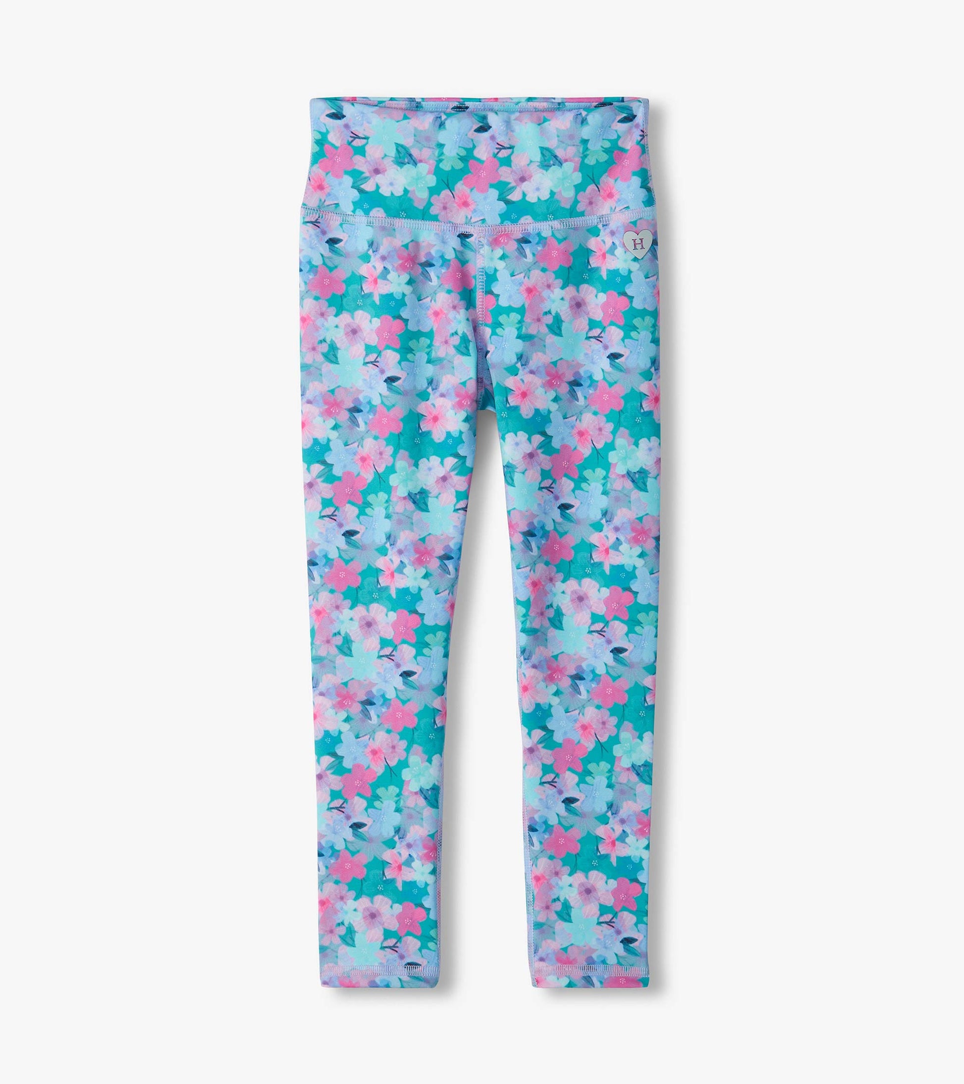 Kids floral leggings with a turquoise background, pink and light blue flowers, and a wide waistband