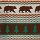Pattern with brown bears, teal trees, and geometric stripes