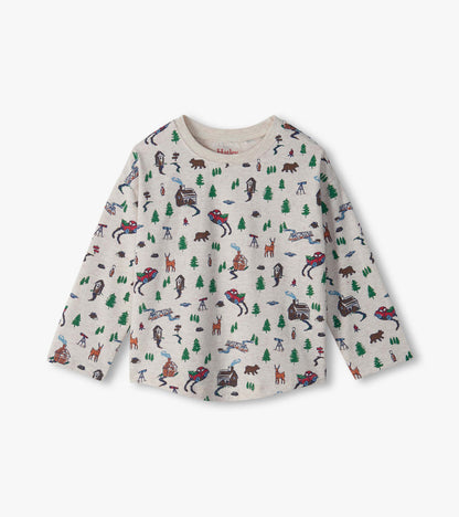 Front view of oatmeal long-sleeve boys T-shirt with forest print of trees, bears, deer, cabins and red trucks