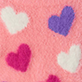 Pink background with five heart shapes in white, purple, and magenta
