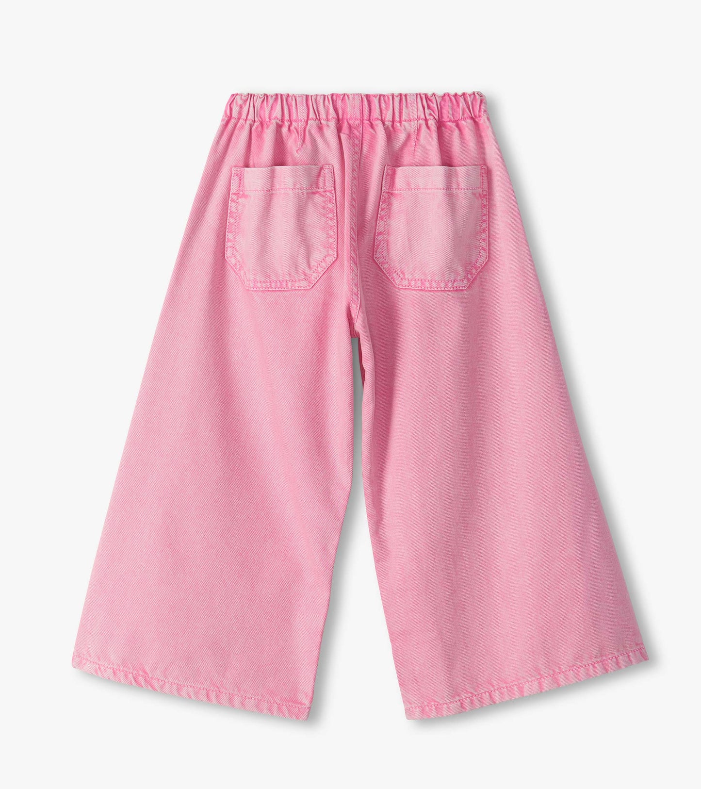 Back view of girls flamingo pink wide leg jeans with elastic waistband and two back patch pockets