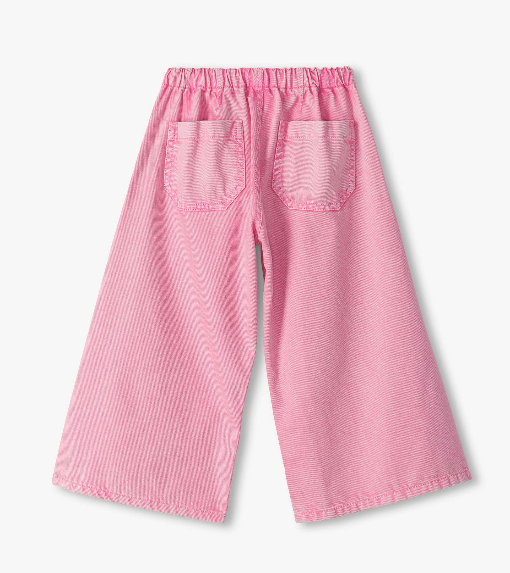 Back view of girls flamingo pink wide leg jeans with elastic waistband and two back patch pockets