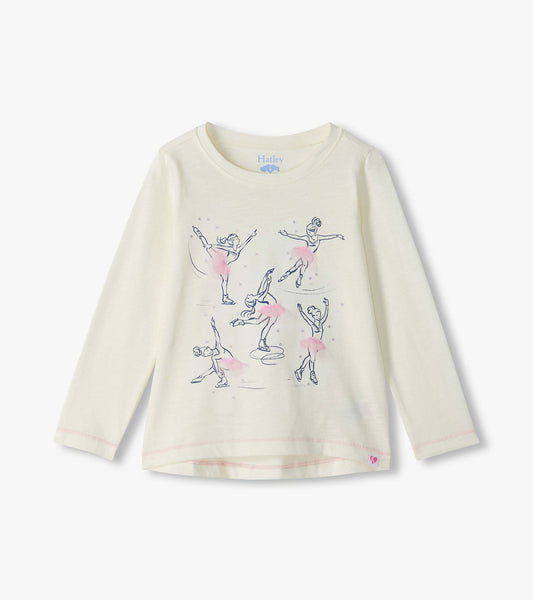 Cream long sleeve tee with figure skater graphic and pink tutu accents on the front