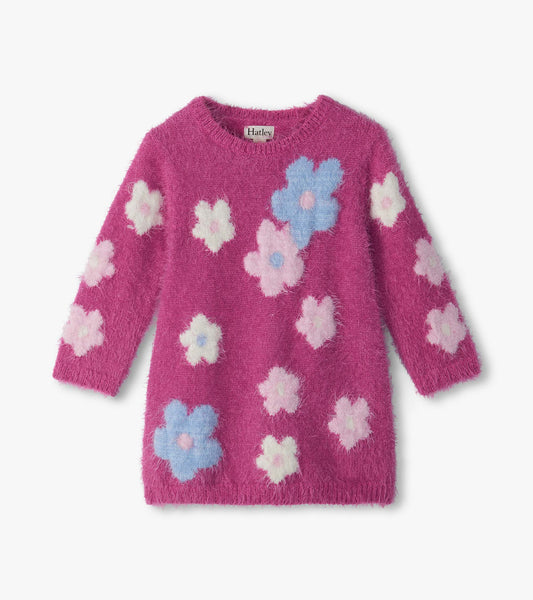 Infant fuzzy pink sweater dress with long sleeves and blue, white, and light pink flower pattern