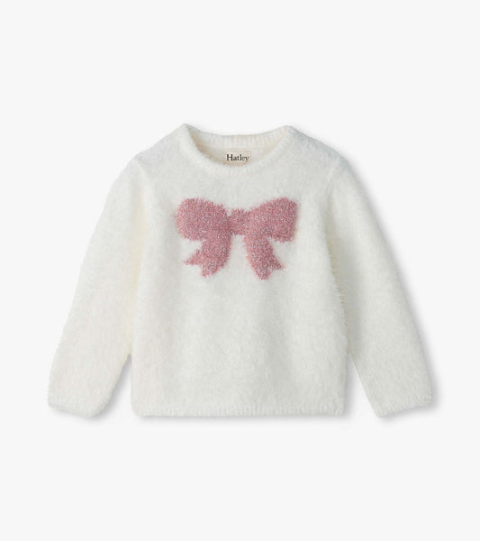 Infant white fuzzy sweater with a pink bow on the front and long sleeves