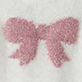 Pink glitter bow on a white background