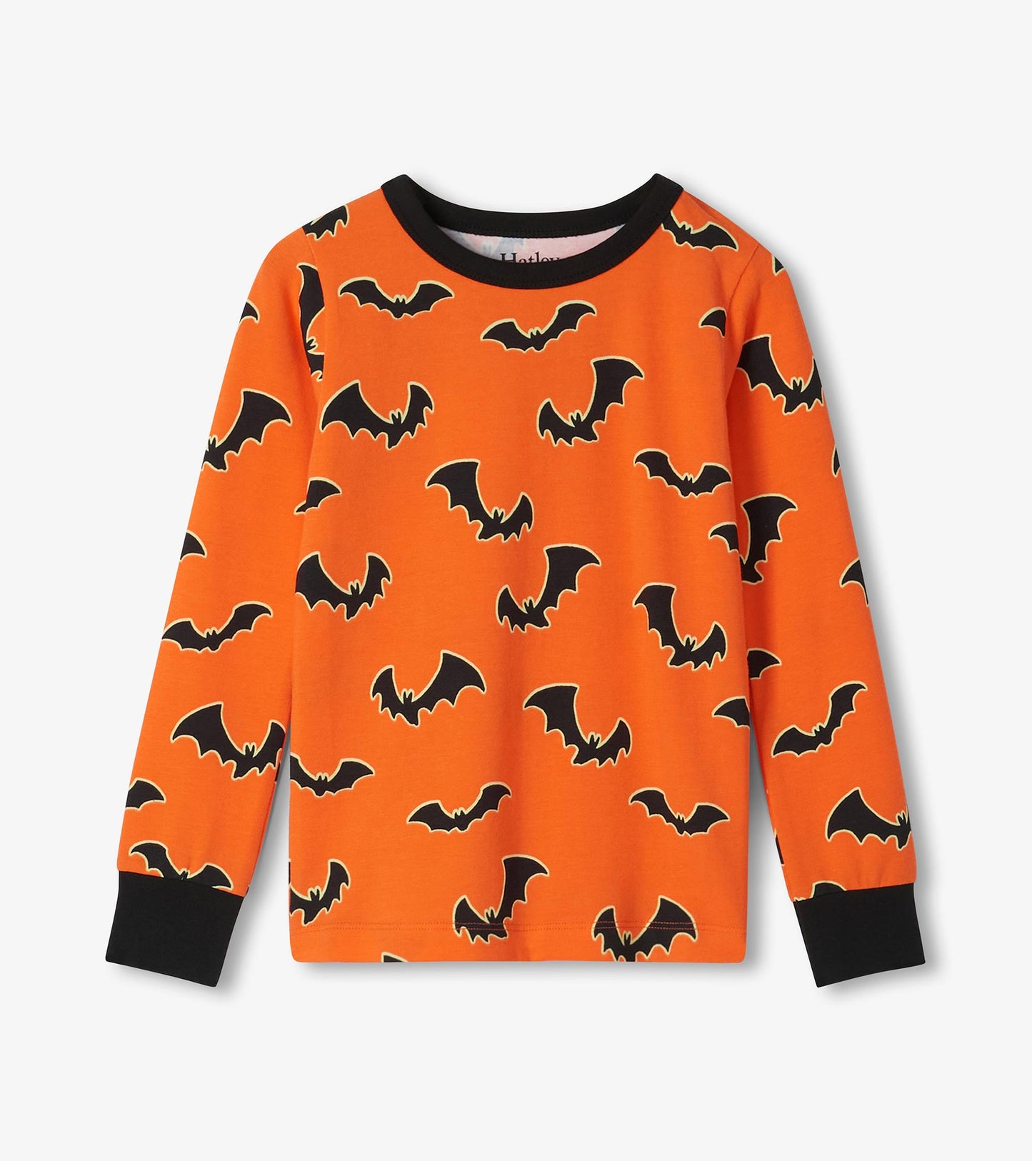 Orange long sleeve pajama top with black bat print and black neck and wrist cuffs