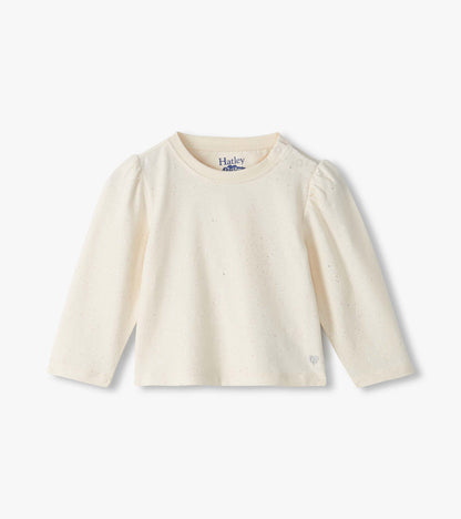 Front view of cream infant tee with subtle glitter speckles, puff shoulders, and shoulder snaps