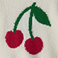 Two red cherries with green stems and leaves on a light background