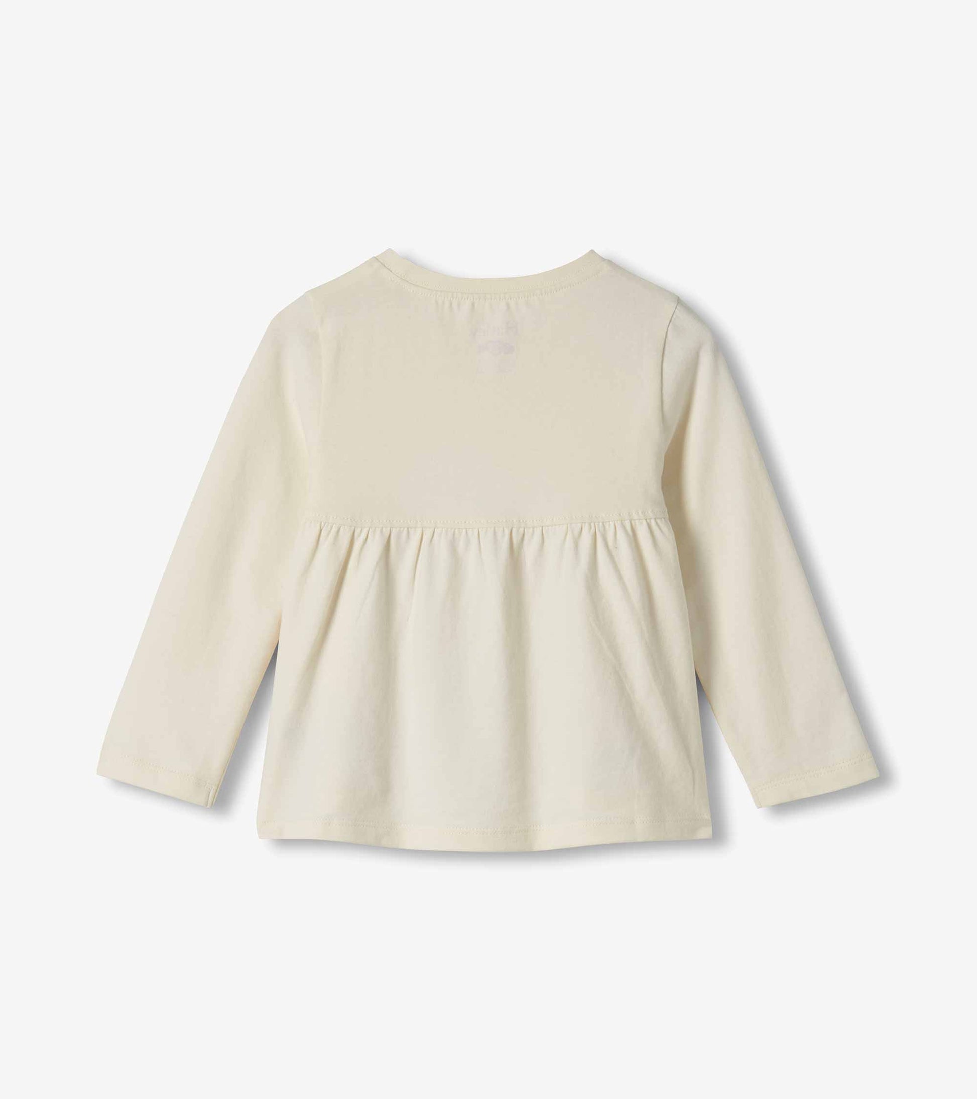 Back view of cream long-sleeve toddler T-shirt with gathered back waist seam