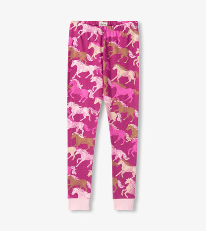 Girls pajama pants in berry pink with allover galloping horse print and light pink ankle cuffs