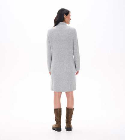 Back view of grey melange sweater dress with long sleeves, high neck, and knee-length straight silhouette