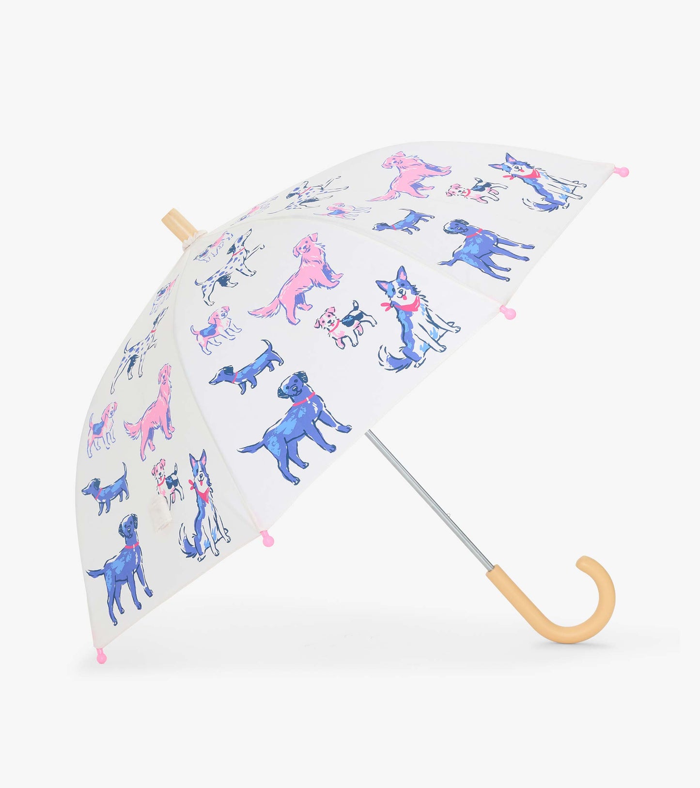Open clear kids umbrella with pink and blue dog print, pink tips, and a curved wood-look handle