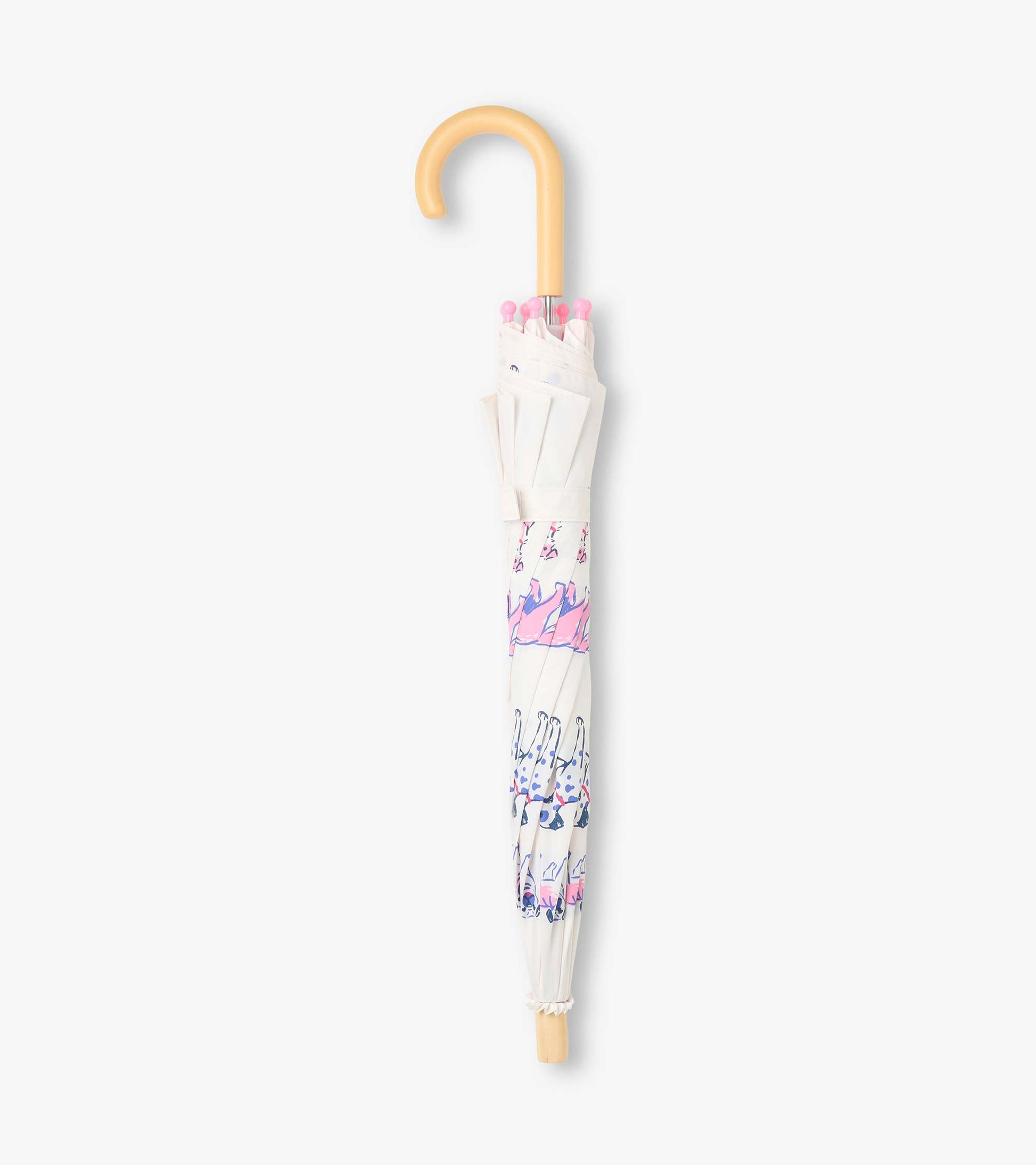 Closed clear umbrella with dog print, pink safety tips, and a curved wood-look handle