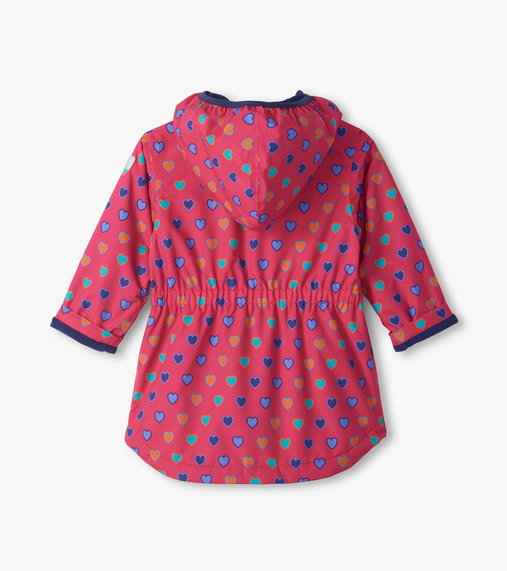 Back view of pink kids field jacket with blue, teal, and orange heart print, hood, and gathered waist
