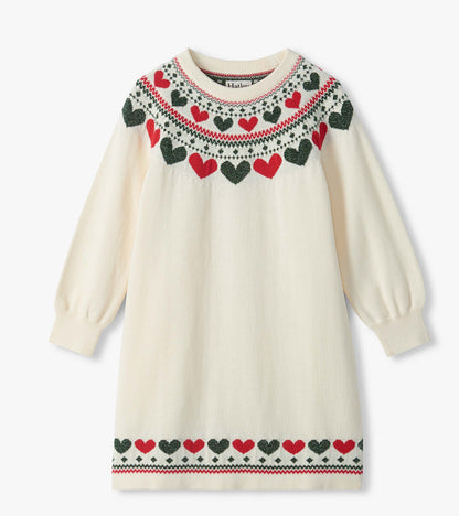 Front view of girls cream sweater dress with red and dark green heart yoke and hem border
