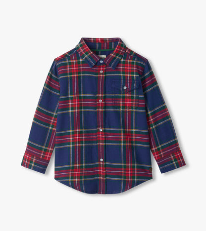 Front view of boys plaid button-down shirt in navy, red, and green with chest pocket and snap buttons