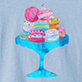 Pink and blue cake on a blue pedestal stand with candles and decorative icing