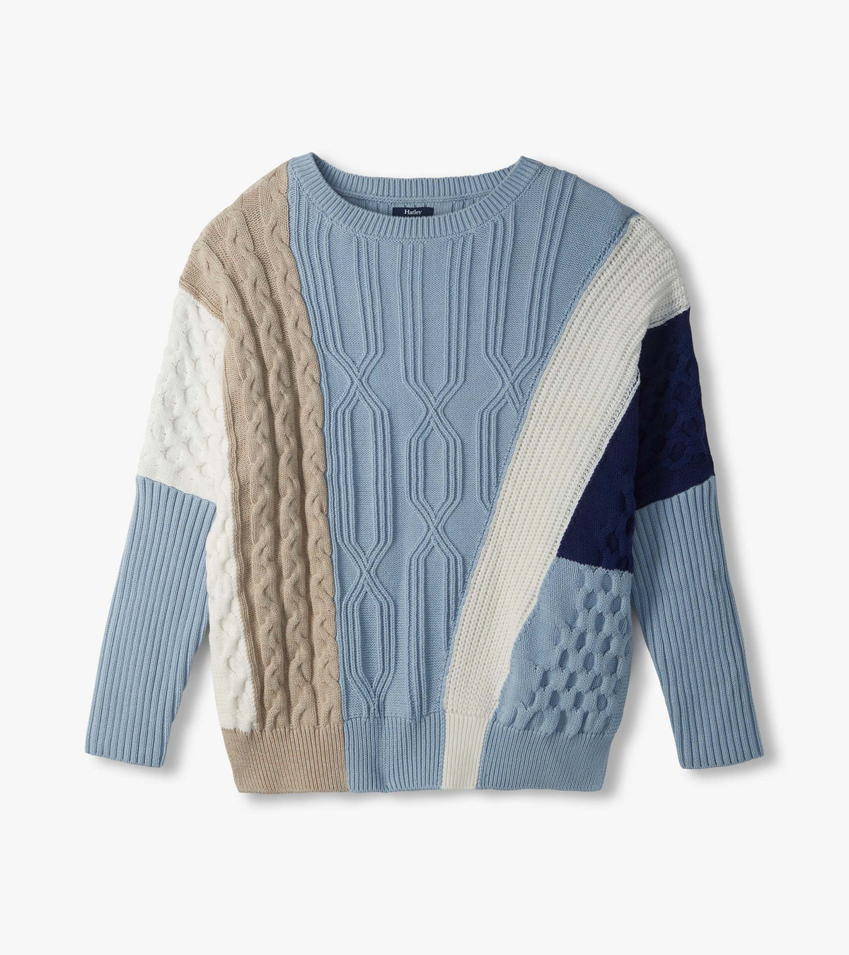 Flat lay of Kentucky Blue mixed pattern sweater with light blue body and cream, beige, and navy panels