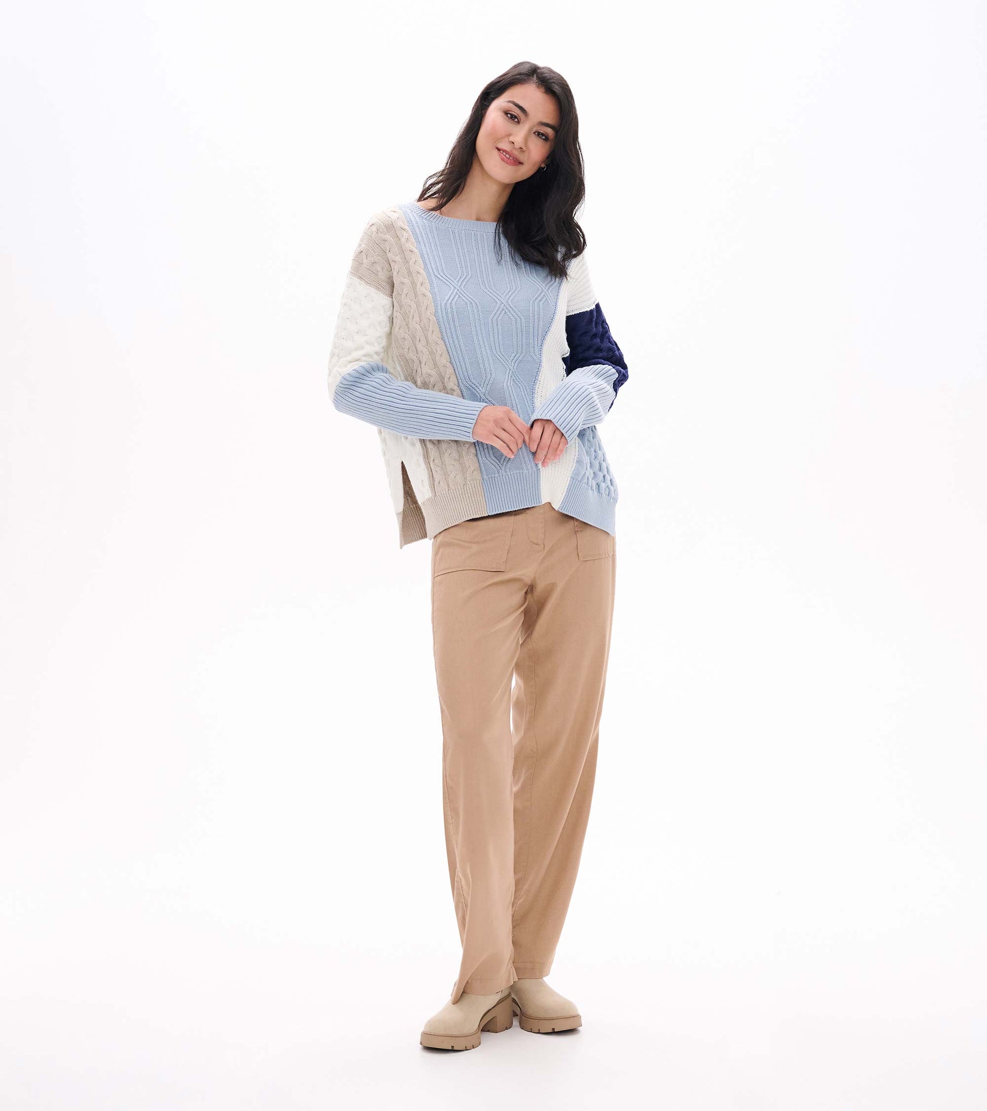 Full front outfit view of Kentucky Blue mixed pattern sweater with tan pants and beige ankle boots