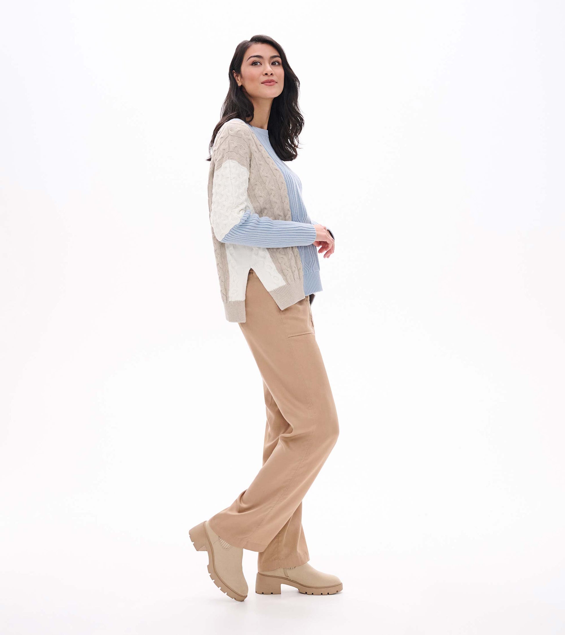 Side view of Kentucky Blue mixed pattern sweater showing drop shoulder and split hem