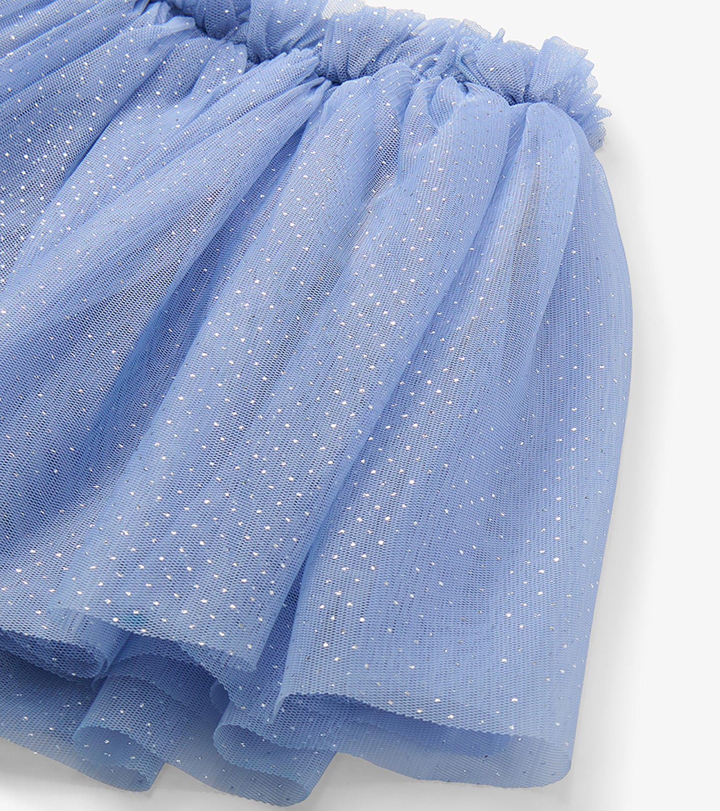Close-up of Kentucky blue tutu skirt showing glitter-dotted tulle layers and gathered elastic waistband