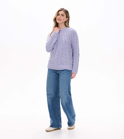 Speckled lilac cable knit sweater styled front view with blue wide leg jeans