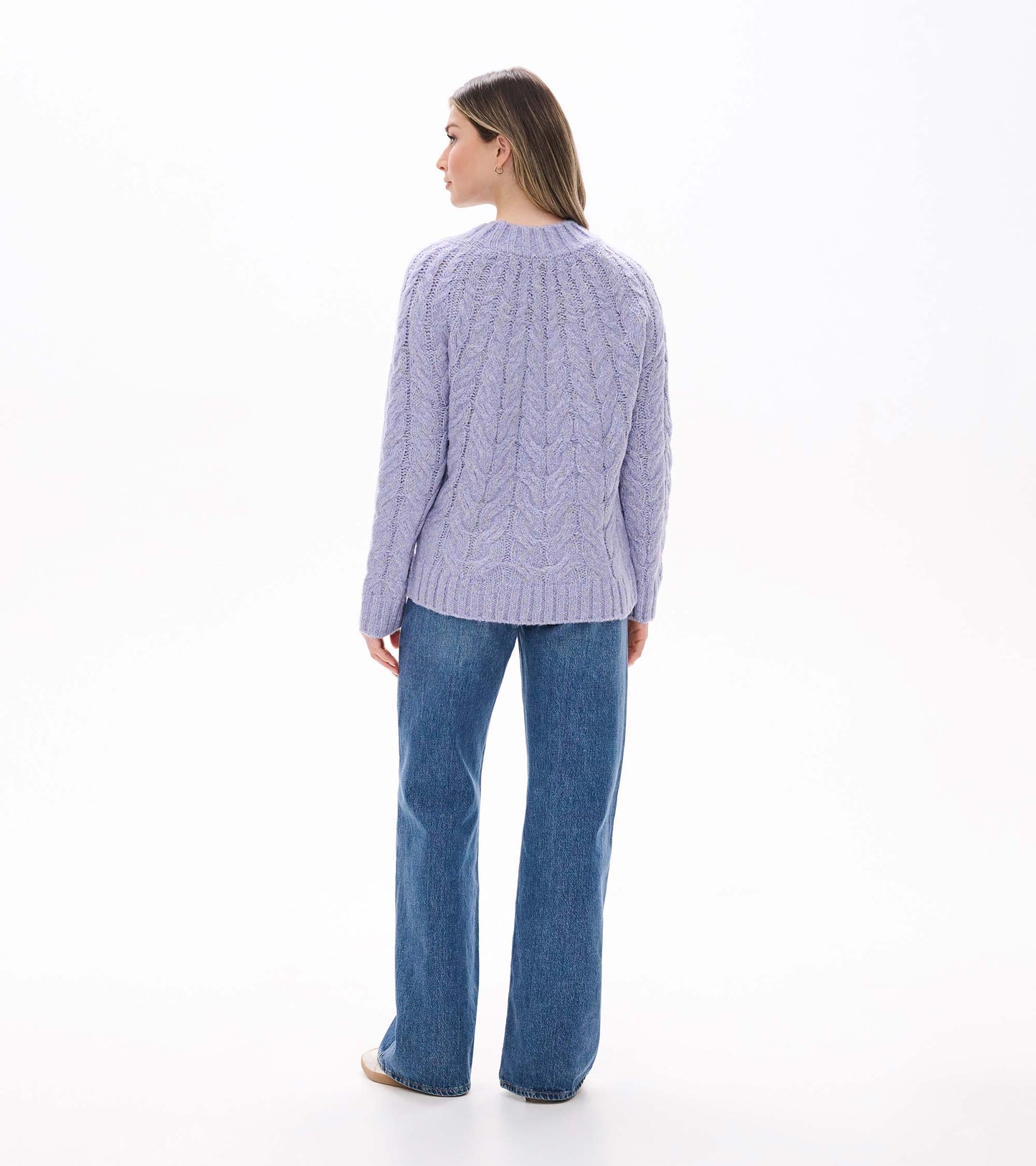Back view of speckled lilac cable knit sweater with crew neck and ribbed hem