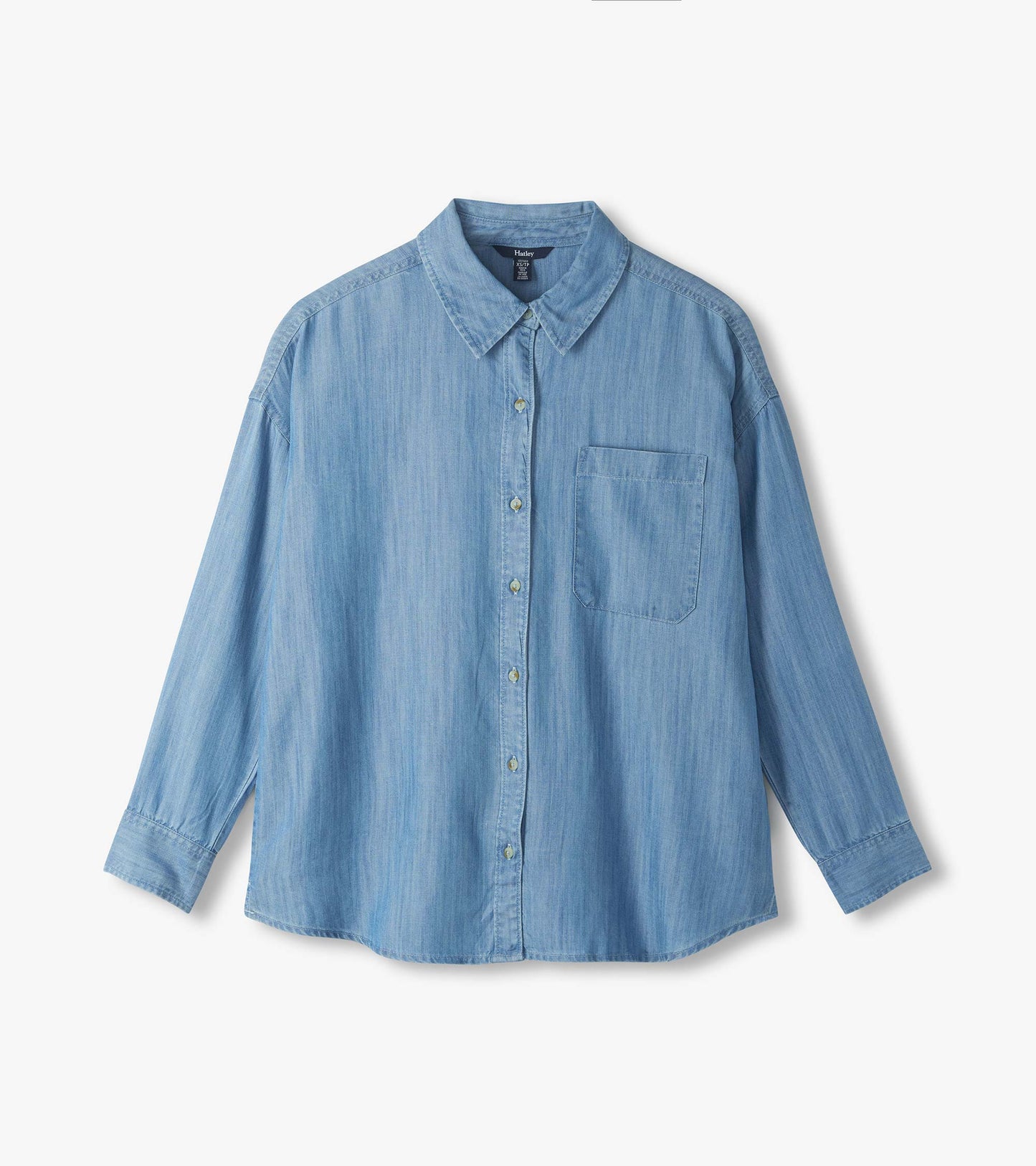 Light blue wash button-down shirt laid flat with pointed collar, chest pocket, and long sleeves