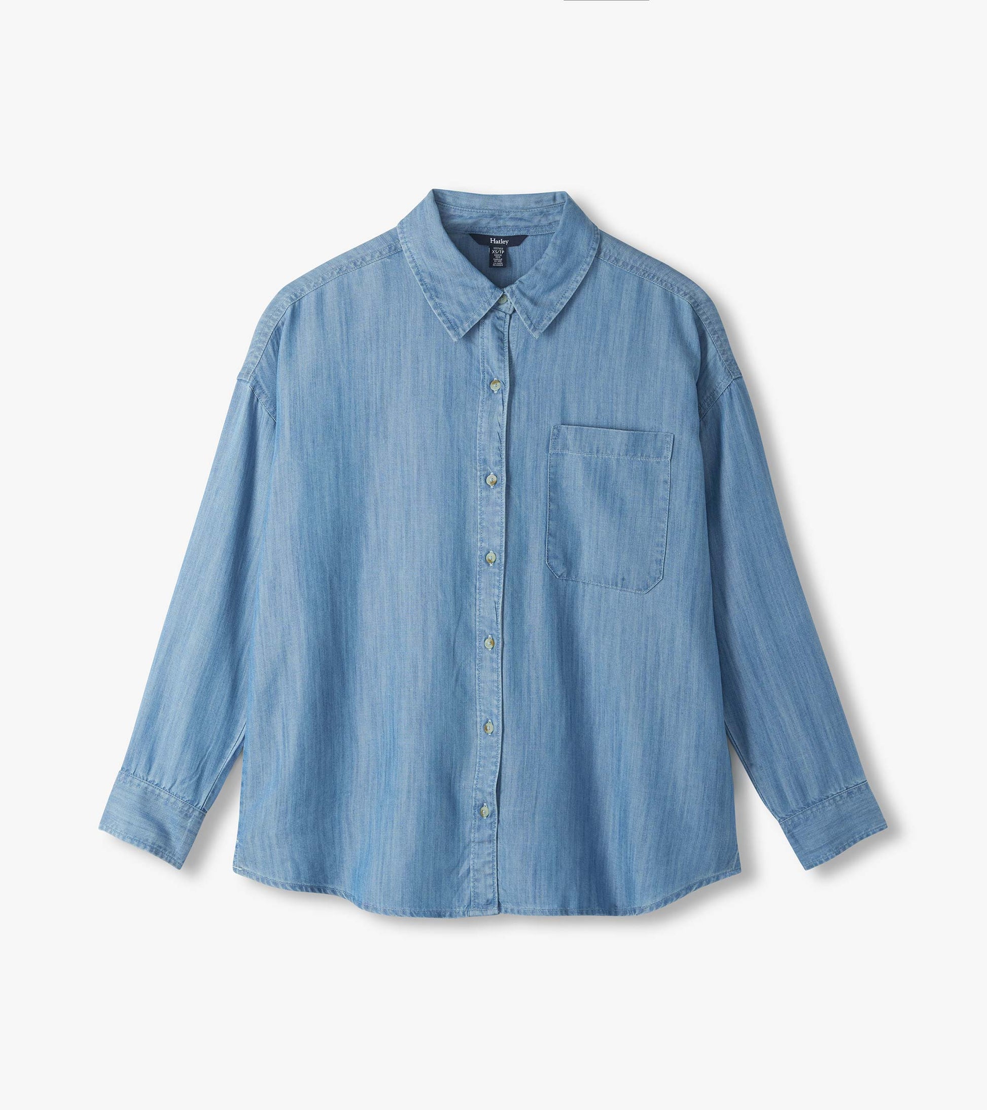 Light blue wash button-down shirt laid flat with pointed collar, chest pocket, and long sleeves