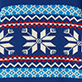 Blue patterned knit design with white snowflake and geometric motifs