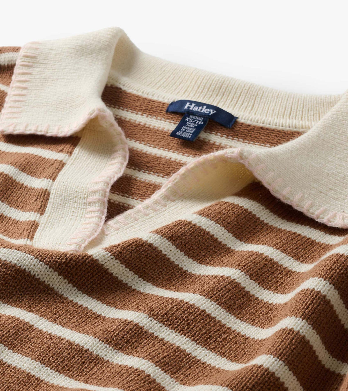 Close-up of camel and cream striped Johnny collar sweater with wide cream collar and visible Hatley label