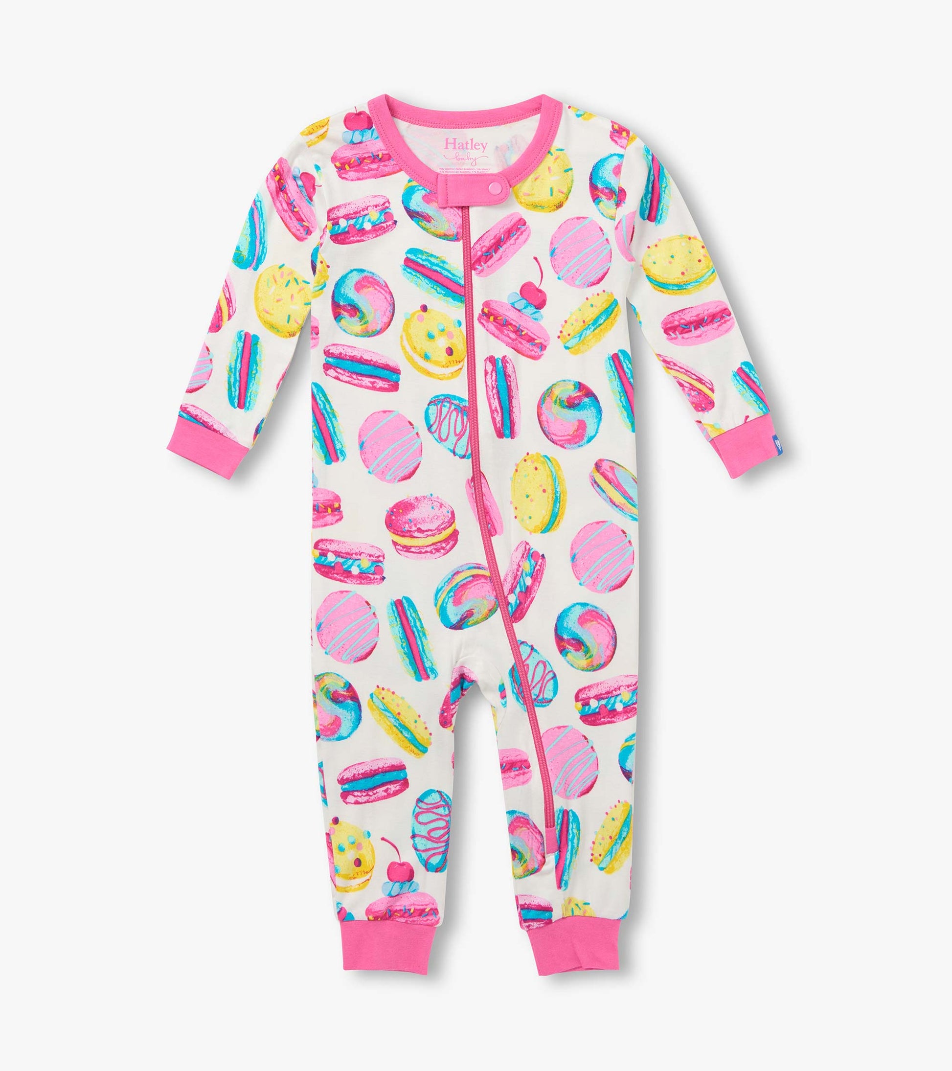 Front view of infant coverall with pink trim, two-way zipper, and colorful macaron and dessert print