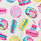 Pattern of colorful frosted donuts and striped lollipops on a light background