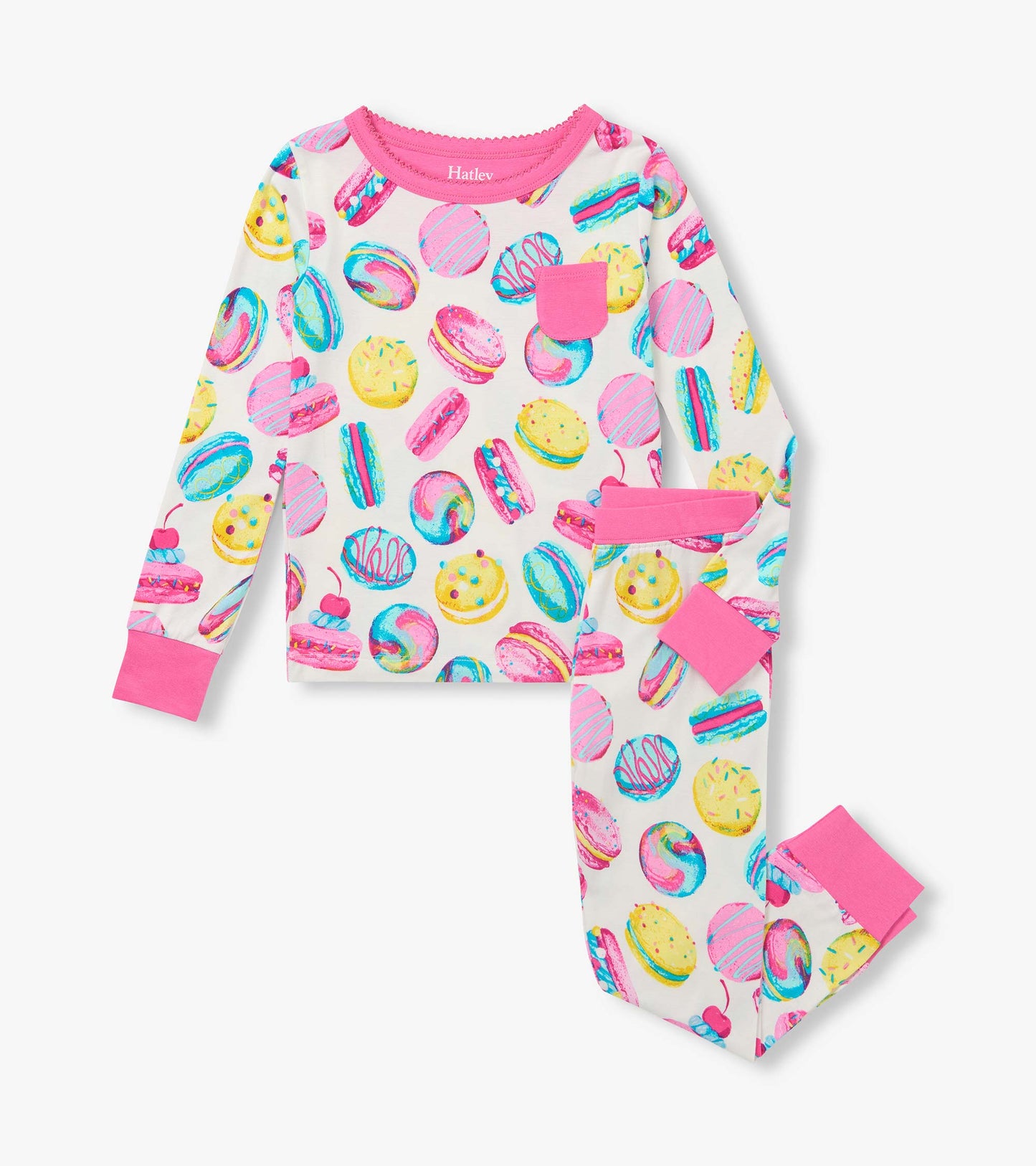 Kids pajama set with colorful macaron print, pink trim, chest pocket, and matching cuffed pants