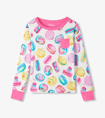 Girls pajama top with pink chest pocket and colorful macaron print on white