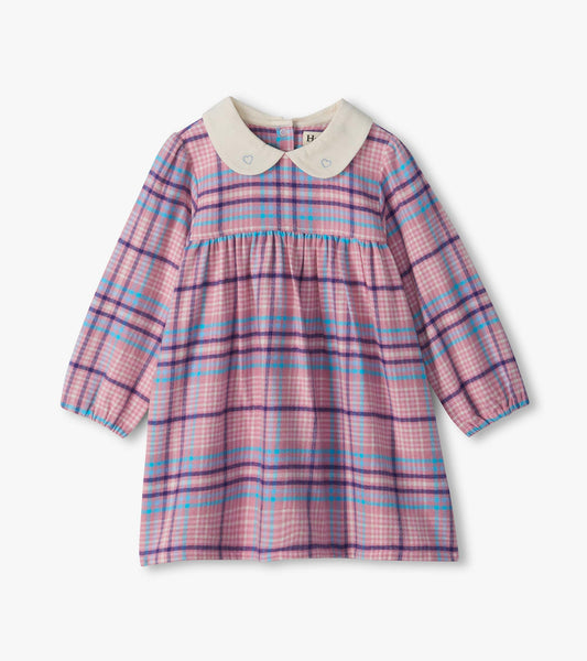 Infant mauve plaid long sleeve dress with white Peter Pan collar and small embroidered hearts